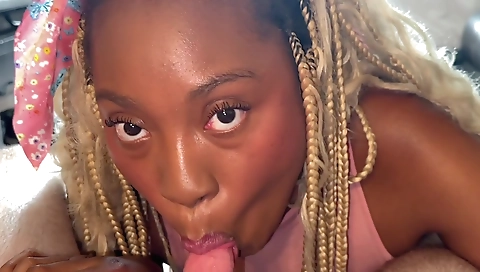 Ebony babe in black stockings gives a blow job with black partner