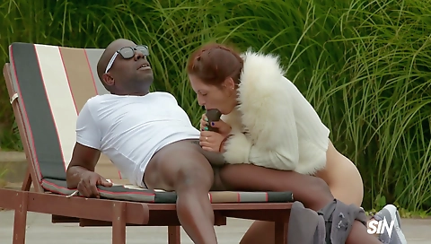 Hairy milf is having fun with a young black hottie