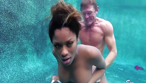 Black hunk plays with her black and brunette pussy