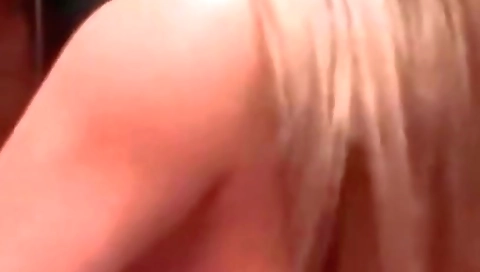 Busty blonde gets fucked by two horny guys in porn