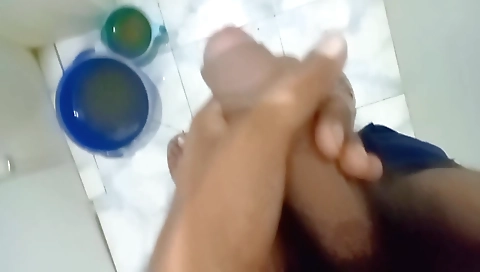 Ebony teen takes a look at her own ass and enjoys it