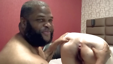 Busty brunette and her black lover fuck in the ass