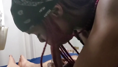 Red-headed pornstar deep throats a black dick in porn film