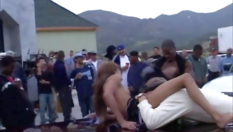 Ebony teen in a public party in a sexy black outfit